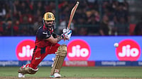 Photo: AP : Virat Kohli plays a shot during the Indian Premier League match between Royal Challengers Bengaluru and Gujarat Titans in Bengaluru.