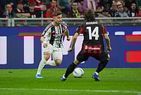 | Photo: Alessio Morgese/LaPresse via AP : Juventus's Francisco Conceicao, left, fights for the ball with AC Milan's Luka Modric during the Serie A soccer match between AC Milan and Juventus, in Milan, Italy.