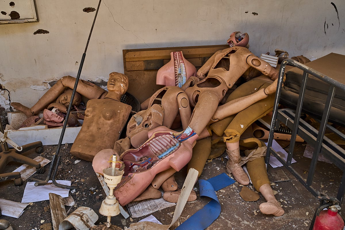 Medicine mannequins piled on the floor 