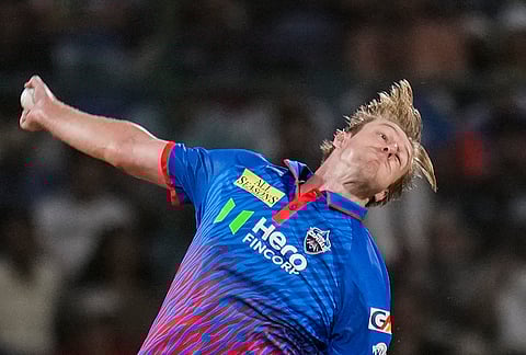 Delhi Capitals' Kyle Jamieson bowls a delivery during the Indian Premier League (IPL) T20 cricket match between Delhi Capitals and Royal Challengers Bengaluru, in New Delhi.