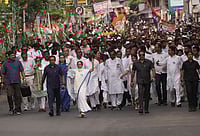 Mamata Banerjee’s Fiery Final Push: Streetfighter CM Wraps Up High-Stakes Election Campaign | Photo: Sandipan Chatterjee/Outlook : West Bengal Chief Minister and Trinamool Congress supremo Mamata Banerjee with party leaders and workers during a roadshow amid the ongoing West Bengal Assembly elections, in Kolkata.