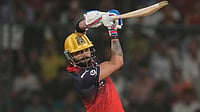 IPL Dispatch: Bowling, Dust Storms Engulf Capitals; Mumbai Replace Injured Santner With Maharaj AP/Manish Swarup : Virat Kohli plays a shot during the Indian Premier League match between Delhi Capitals and Royal Challengers Bengaluru in Delhi.