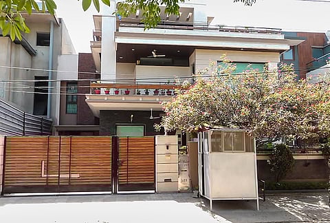 An outside view of the residence of former Punjab police DIG Harcharan Singh Bhullar, in Chandigarh. The Enforcement Directorate on Monday conducted searches at multiple locations in the state as part of a money laundering probe against Harcharan Singh Bhullar and entities linked to him. 