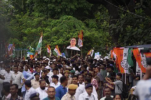 Supporters during a roadshow led by West Bengal Chief Minister and Trinamool Congress supremo Mamata Banerjee amid the ongoing West Bengal Assembly elections, in Kolkata.