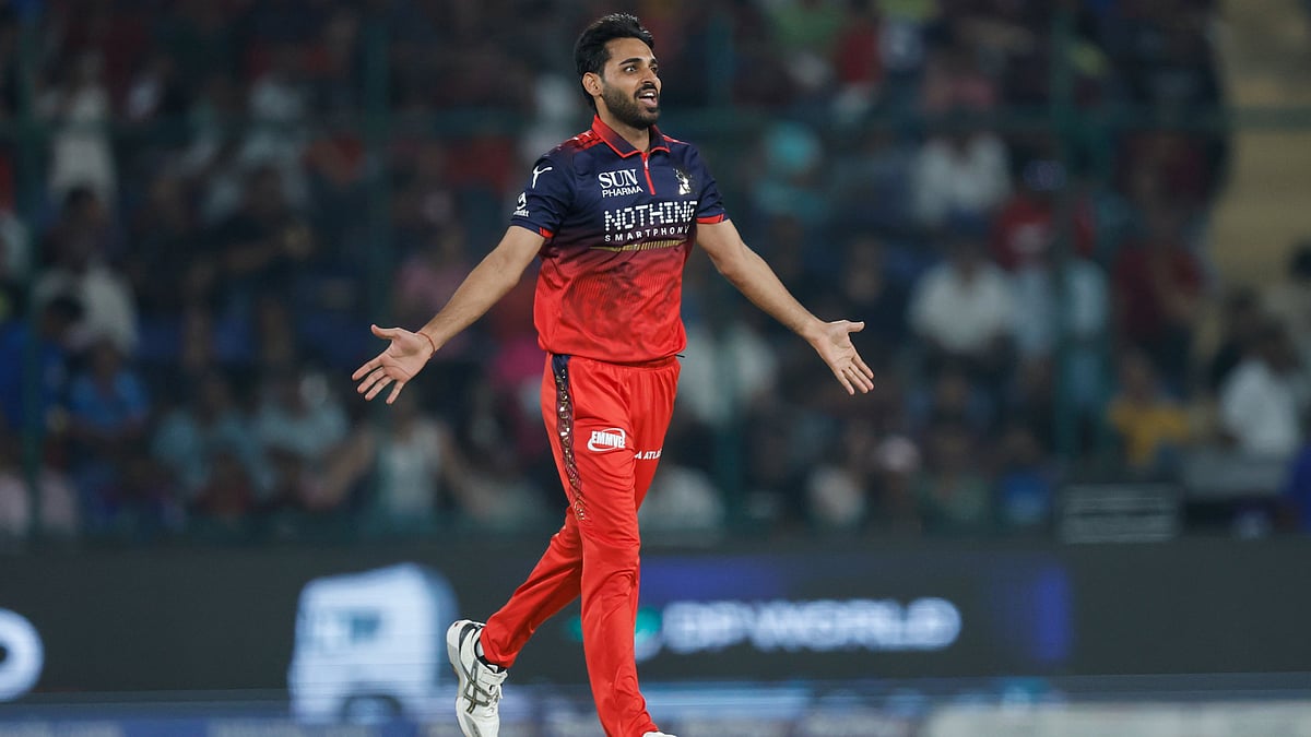Bhuvneshwar Kumar celebrates a wicket during DC vs RCB IPL 2026 match at the Arun Jaitley Stadium in Delhi.  - IPL/X