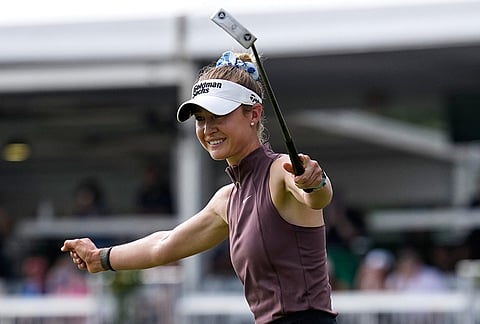 Nelly Korda celebrates after winning the Chevron Championship LPGA golf tournament in Houston.