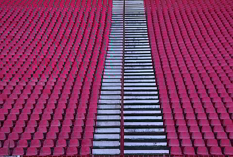 An empty stadium sector, part of the measure to divide Red Star and Partizan supporters, is seen during a Serbian National soccer league derby match between Red Star and Partizan in Belgrade, Serbia.