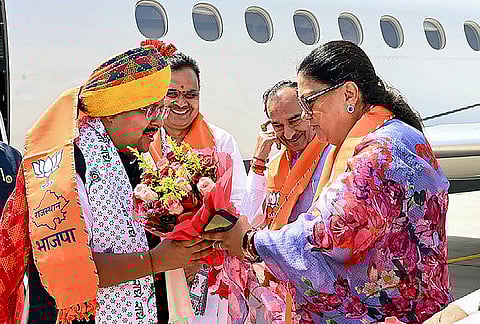 BJP National President Nitin Nabin being welcomed by party leader Vasundhara Raje on his arrival, in Jaipur. Rajasthan Chief Minister Bhajan Lal Sharma looks on. 