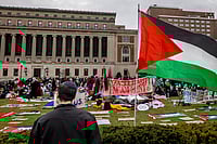 Source: IMAGO / Anadolu Agency : APRIL 19, 2024: A view of the banners and Palestinian flags as Pro-Palestinian student protesters resume demonstrations on Friday at Columbia University on the third day of Gaza Solidarity Encampment after mass arrests by New York Police Department in New York, United States on April 19, 2024.
