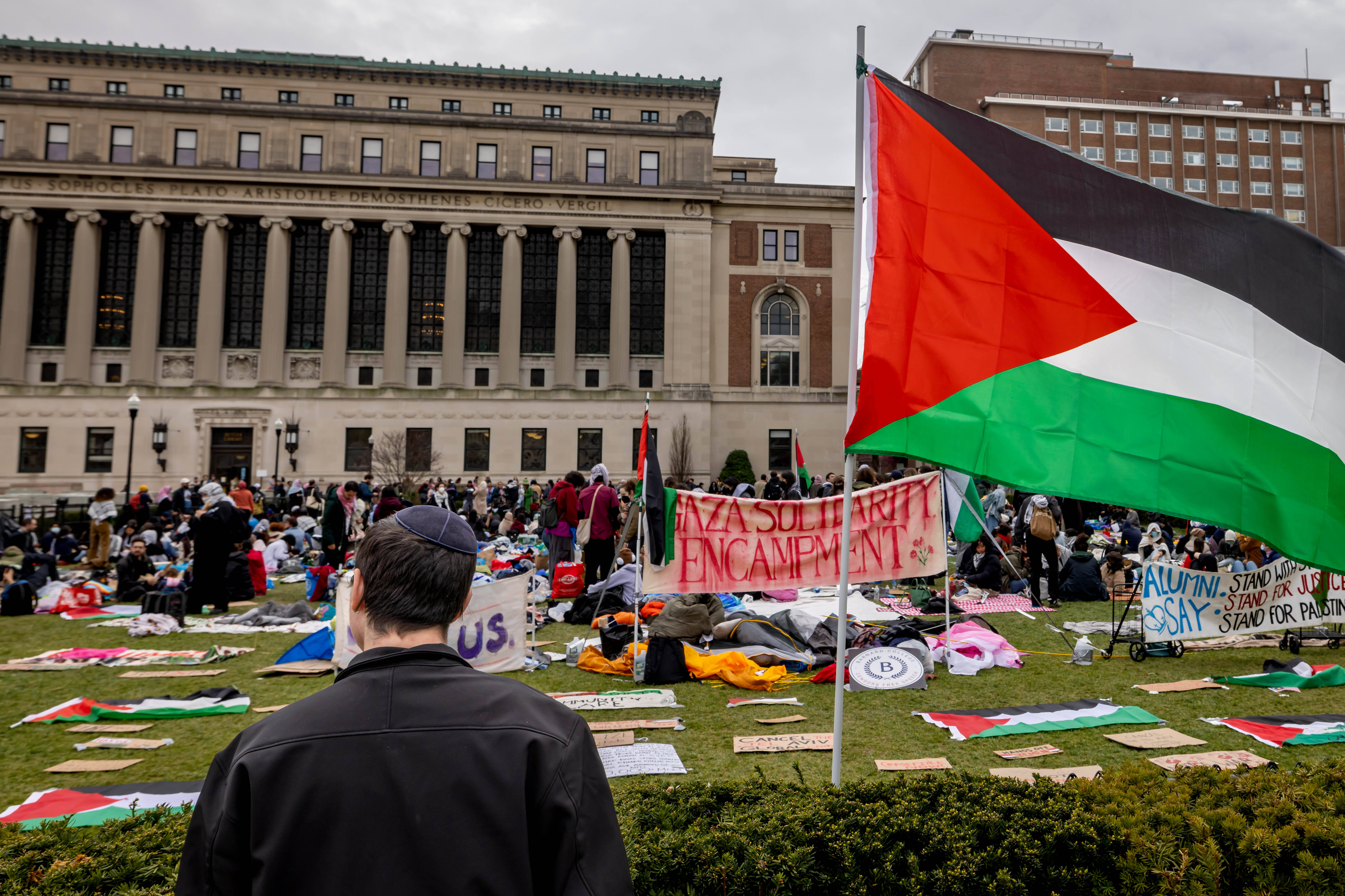 Documenting Crisis: Ethics Of The Lens In Modern Photojournalism Source: IMAGO / Anadolu Agency : APRIL 19, 2024: A view of the banners and Palestinian flags as Pro-Palestinian student protesters resume demonstrations on Friday at Columbia University on the third day of Gaza Solidarity Encampment after mass arrests by New York Police Department in New York, United States on April 19, 2024.