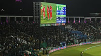 AP Photo : Fans cheer during the Pakistan Super League Qualifier cricket match between Peshawar Zalmi and Islamabad United, in Karachi, Pakistan, Tuesday,