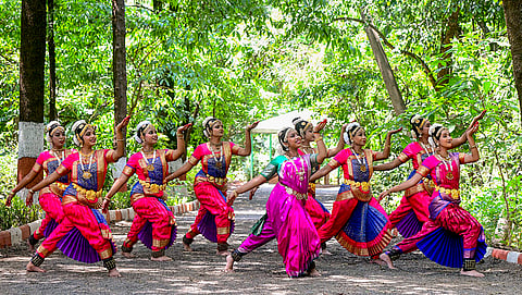 Bharatanatyam artists perform on the eve of International Dance Day, at Ekant Park, in Bhopal, Madhya Pradesh.