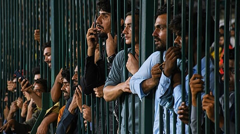 Fans cheer during the Pakistan Super League Qualifier cricket match between Peshawar Zalmi and Islamabad United, in Karachi, Pakistan, Tuesday, April 28, 2026.