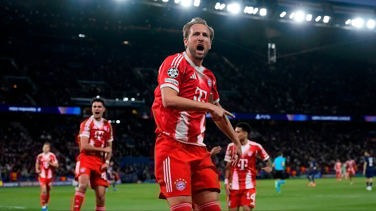 Bayern's Harry Kane celebrates after scoring a penalty, the opening goal of his team during the Champions League semifinal first leg soccer match between Paris Saint-Germain and Bayern Munich in Paris. - AP Photo