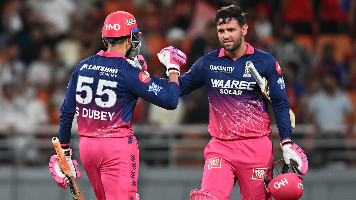 AP Photo : Rajasthan Royals' Donovan Ferreira, right, and Rajasthan Royals' Shubham Dubey celebrates after they won the Indian Premier League cricket match against Punjab Kings in New Chandigarh
