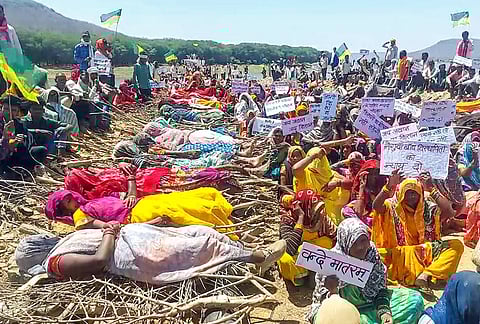 Adivasis affected by compensation in Ken-Betwa link project hold Chita Andolan in Chhatarpur, Madhya Pradesh.