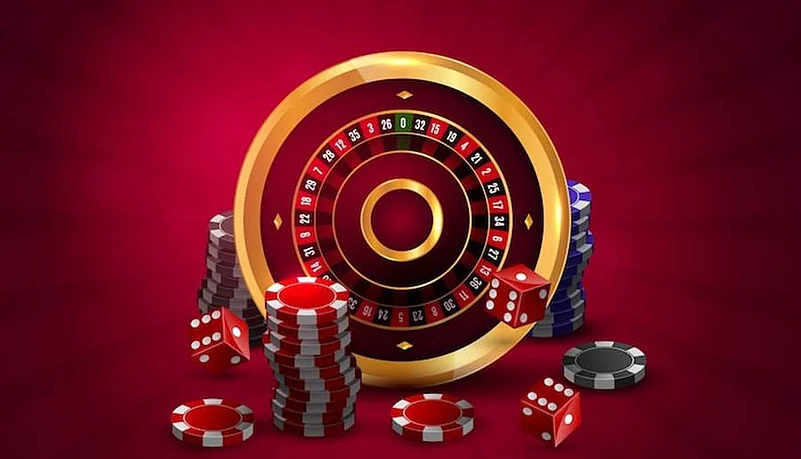 Casino roulette wheel with chips and dice