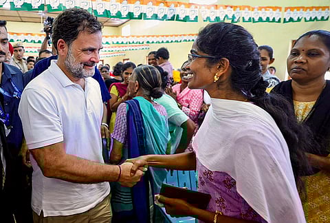 Congress MP and Lok Sabha LoP Rahul Gandhi interacts with a woman during his meeting with settler families and ex-servicemen from the community, at the Community Hall, in Gandhi Nagar, Andaman and Nicobar Islands. 