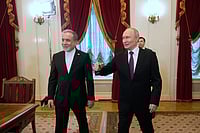 AP Photo/Dmitri Lovetsky  : Russian President Vladimir Putin, right, and Iranian Foreign Minister Abbas Araghchi walk to attend the talks at the Boris Yeltsin Presidential Library, in St. Petersburg, Russia.
