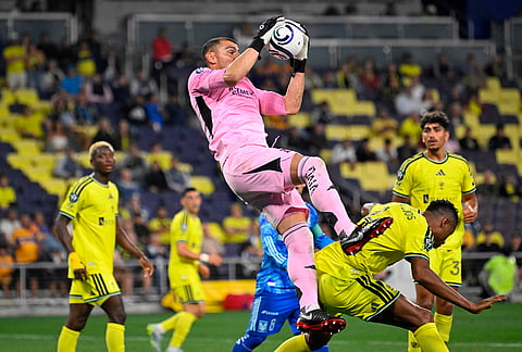 UANL Tigres goalkeeper Nahuel Guzmán (1) makes a save against Nashville SC during the second half of an CONCACAF Champions Cup first leg semifinal soccer match in Nashville, Tennessee.