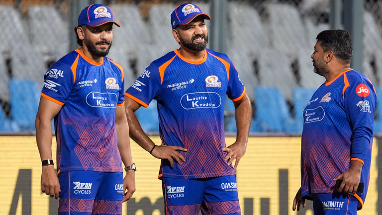 Rohit Sharma, centre, along with support staff during a practice session ahead of the Indian Premier League match between Mumbai Indians and Sunrisers Hyderabad, in Mumbai. - PTI/Kunal Patil