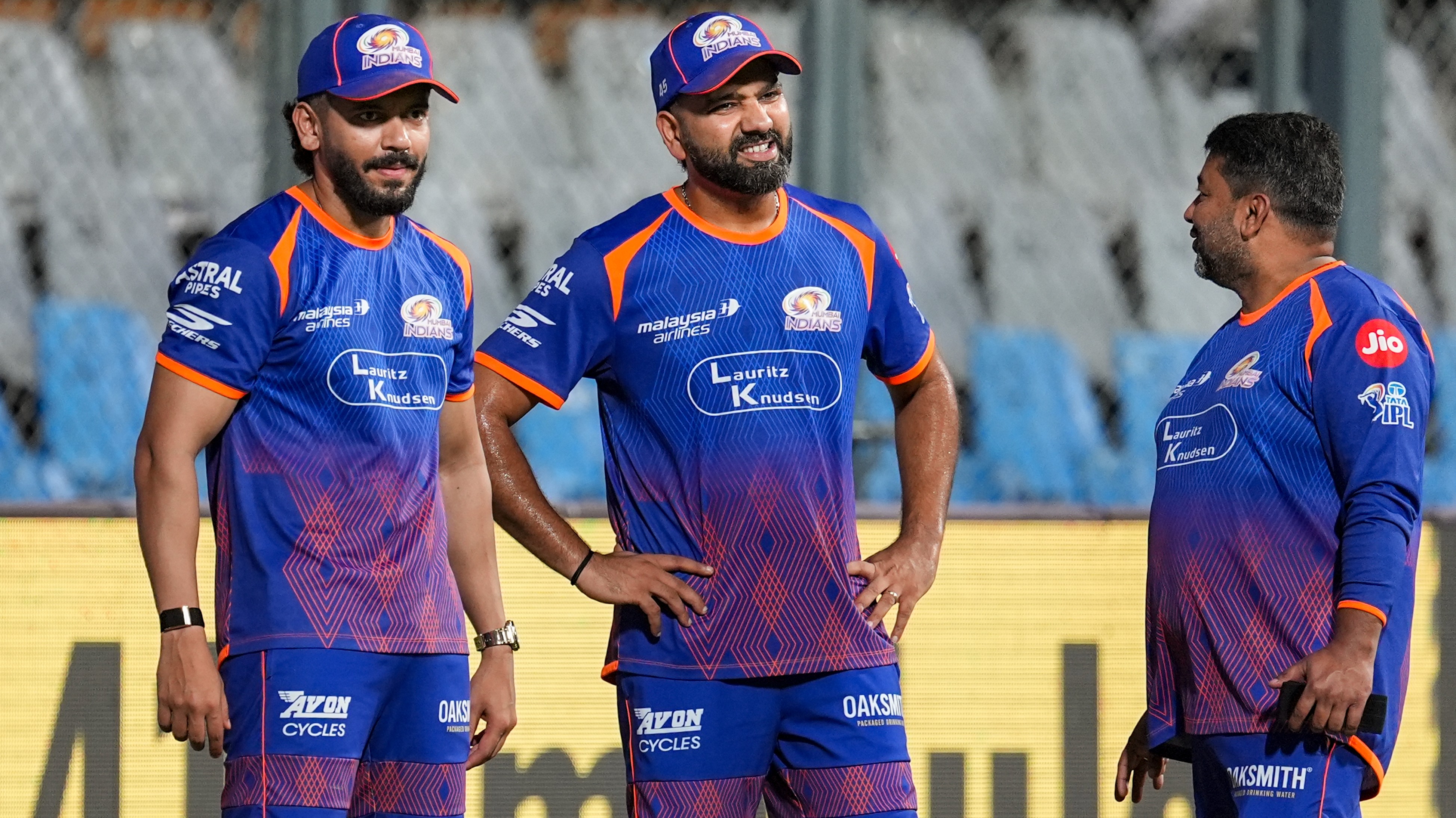 PTI/Kunal Patil : Rohit Sharma, centre, along with support staff during a practice session ahead of the Indian Premier League match between Mumbai Indians and Sunrisers Hyderabad, in Mumbai.