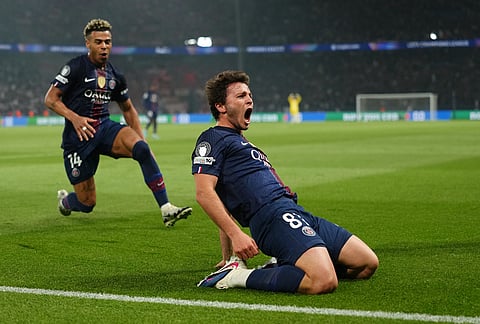 PSG's Joao Neves celebrates after scoring his side's second goal during a Champions League semifinal, first leg, soccer match between Paris Saint-Germain and Bayern Munich in Paris.