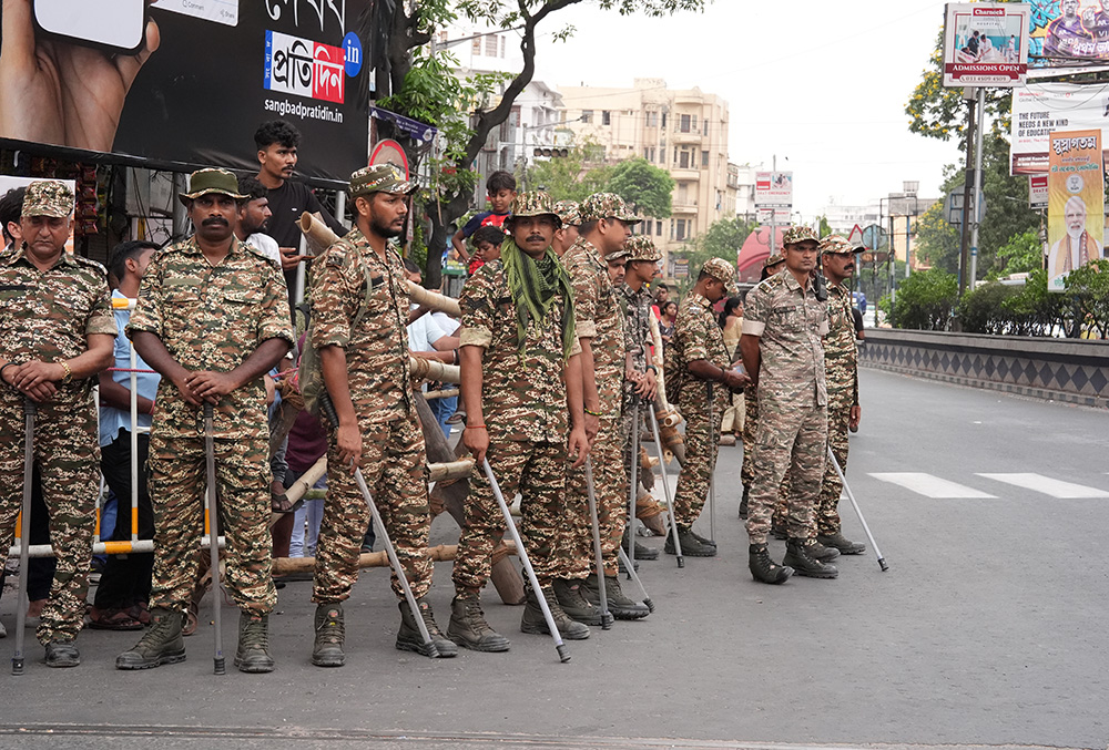 Armed security personnel keep vigil amid the West Bengal Assembly elections, in Kolkata.