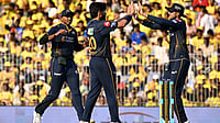 AP : Arshad Khan, centre, celebrates with captain Shubman Gill, right, the wicket of Shivam Dube during the Indian Premier League match between Chennai Super Kings and Gujarat Titans in Chennai.