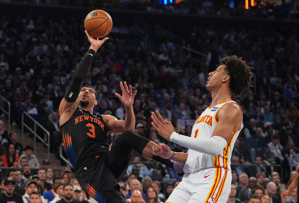 New York Knicks' Josh Hart (3) shoots over Atlanta Hawks' Jalen Johnson (1) during the first half in Game 5 of a first-round NBA playoffs basketball series, in New York. 
