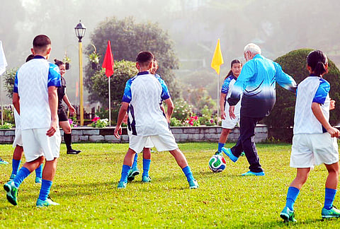 Prime Minister Narendra Modi plays football with youngsters during his visit to Sikkim, in Gangtok