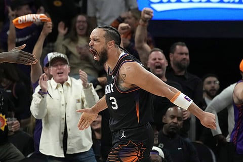 Phoenix Suns forward Dillon Brooks celebrates his score and being fouled during the second half of Game 4 in a first-round NBA playoffs basketball series against the Oklahoma City Thunder in Phoenix.