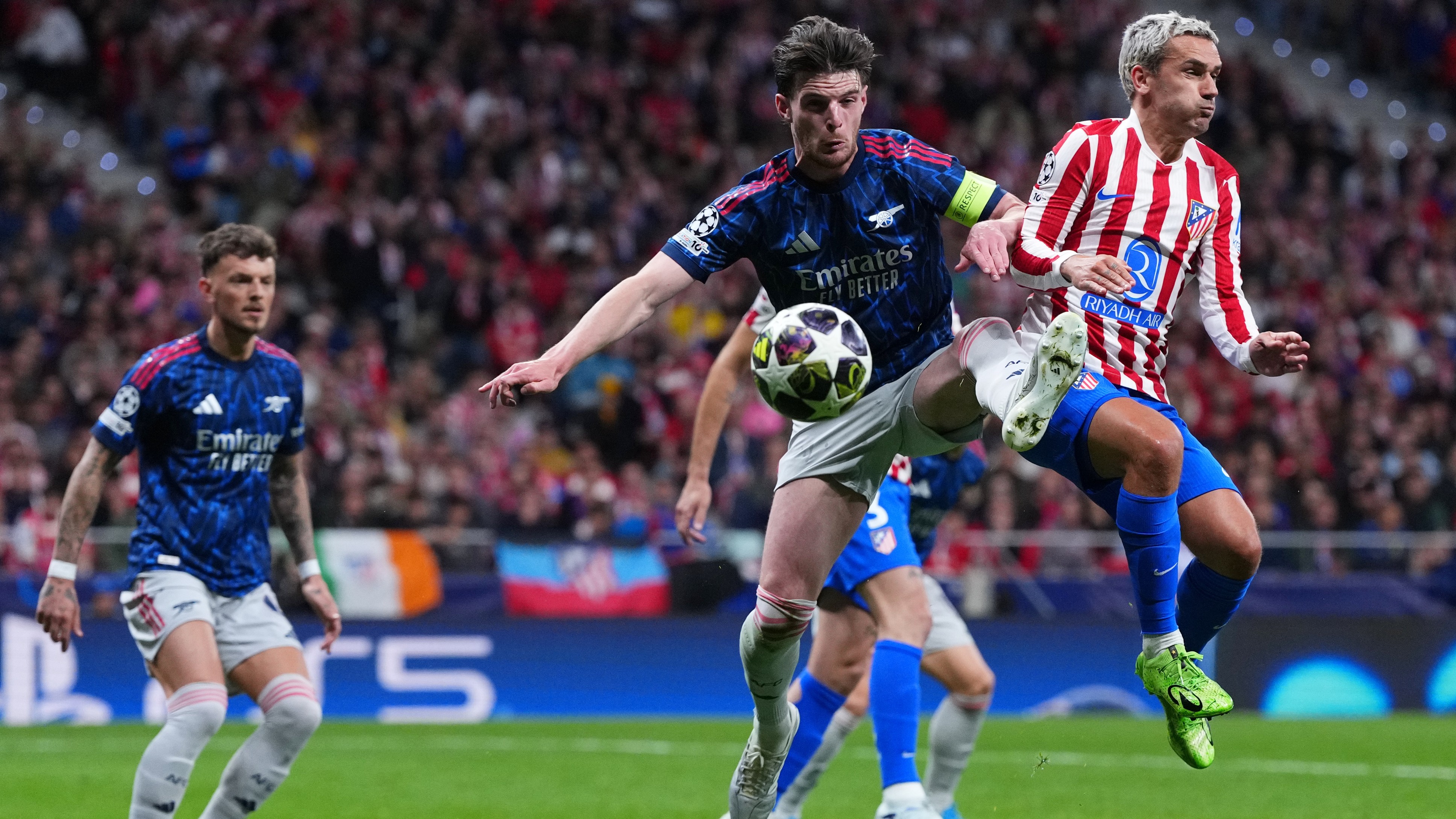 Arsenal's Declan Rice, left, challenges Atletico Madrid's Antoine Griezmann during a Champions League semifinal, first leg, soccer match between Atletico Madrid and Arsenal in Madrid. - AP Photo