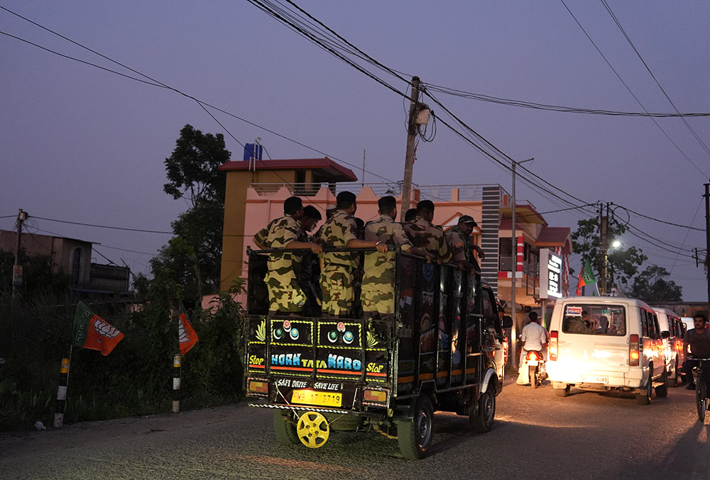 Central Armed Police Forces personnel patrol on the eve of the second phase of the West Bengal Assembly elections.