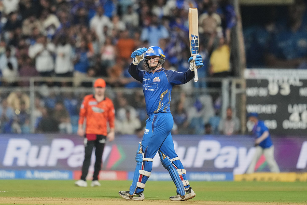 Mumbai Indians Ryan Rickelton celebrates his fifty runs