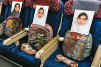 Irreconcilable Impasse: Is Peace In West Asia Just A Mirage? | Photo: Hamed Malekpour : Grounded Lives: An Iranian delegation traveling to Islamabad in April 2026 for peace talks made a symbolic gesture by placing photographs and belongings of children killed in the Minab school strike on empty airplane seats