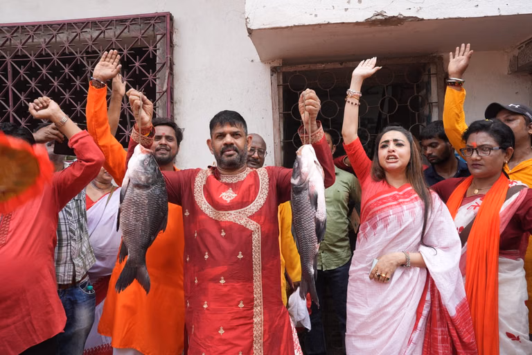 All India Trinamool Congress (Trinamool) claims The Bharatiya Janata Party (BJP) is “not Bengali”. Breaking this perception, BJP candidate Rakesh Singh, Kolkata Port Assembly constituency in the upcoming West Bengal Assembly elections held a morning procession following traditional Bengali customs, women wore sarees, carrying fish in their hands, while campaigning door to door on the day of Bengali New Year. - Photo by Sandipan Chatterjee