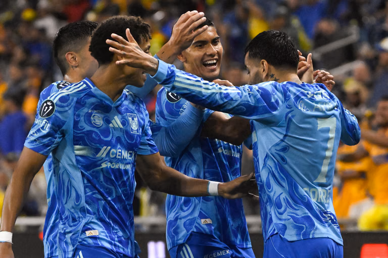 UANL Tigres forward Ángel Correa, right, celebrates his goal against Nashville SC with Francisco Reyes, second from right, and other team mates during the first half of an CONCACAF Champions Cup first leg semifinal soccer match in Nashville, Tennessee. - | Photo: AP/John Amis