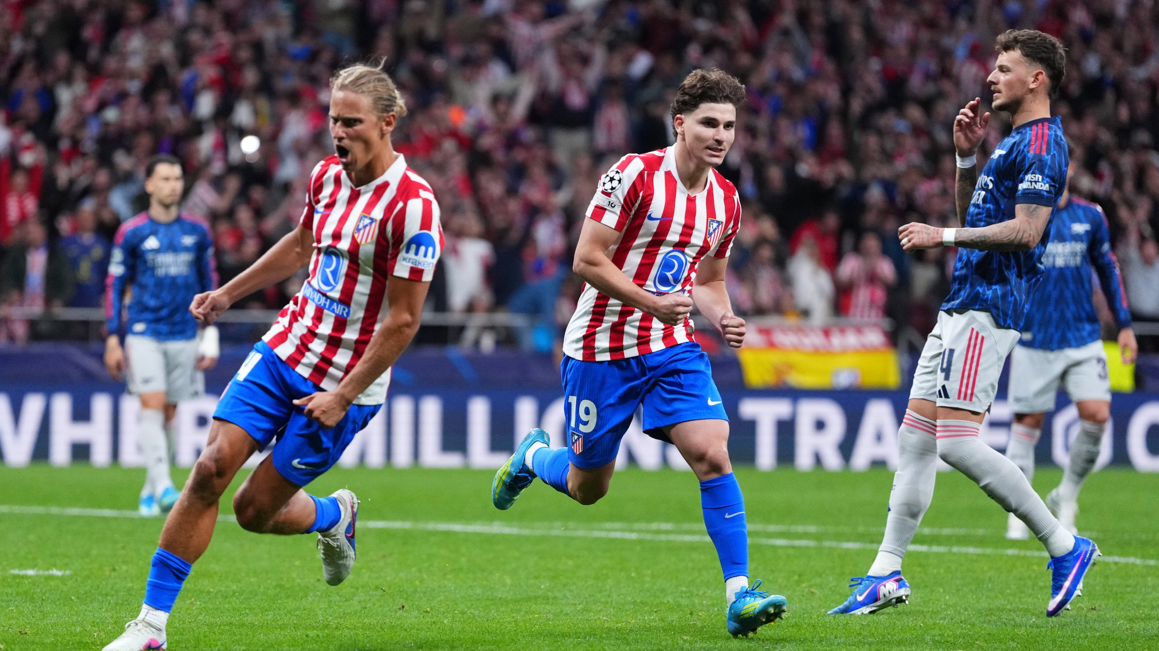 Atletico Madrid's Julian Alvarez, center, celebrates after scoring his sides first goal during a Champions League semifinal, first leg, soccer match between Atletico Madrid and Arsenal in Madrid.  - AP Photo