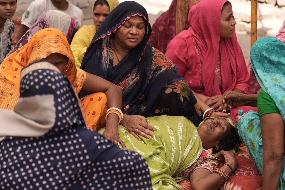 Pandav Kumar’s mother, Meena Devi, has been drifting in and out of consciousness since Tuesday night. Unable to bear the trauma of her young son’s murder, she was hospitalised on Tuesday night but returned to the protest site outside their home in Uttam Nagar on Wednesday morning.