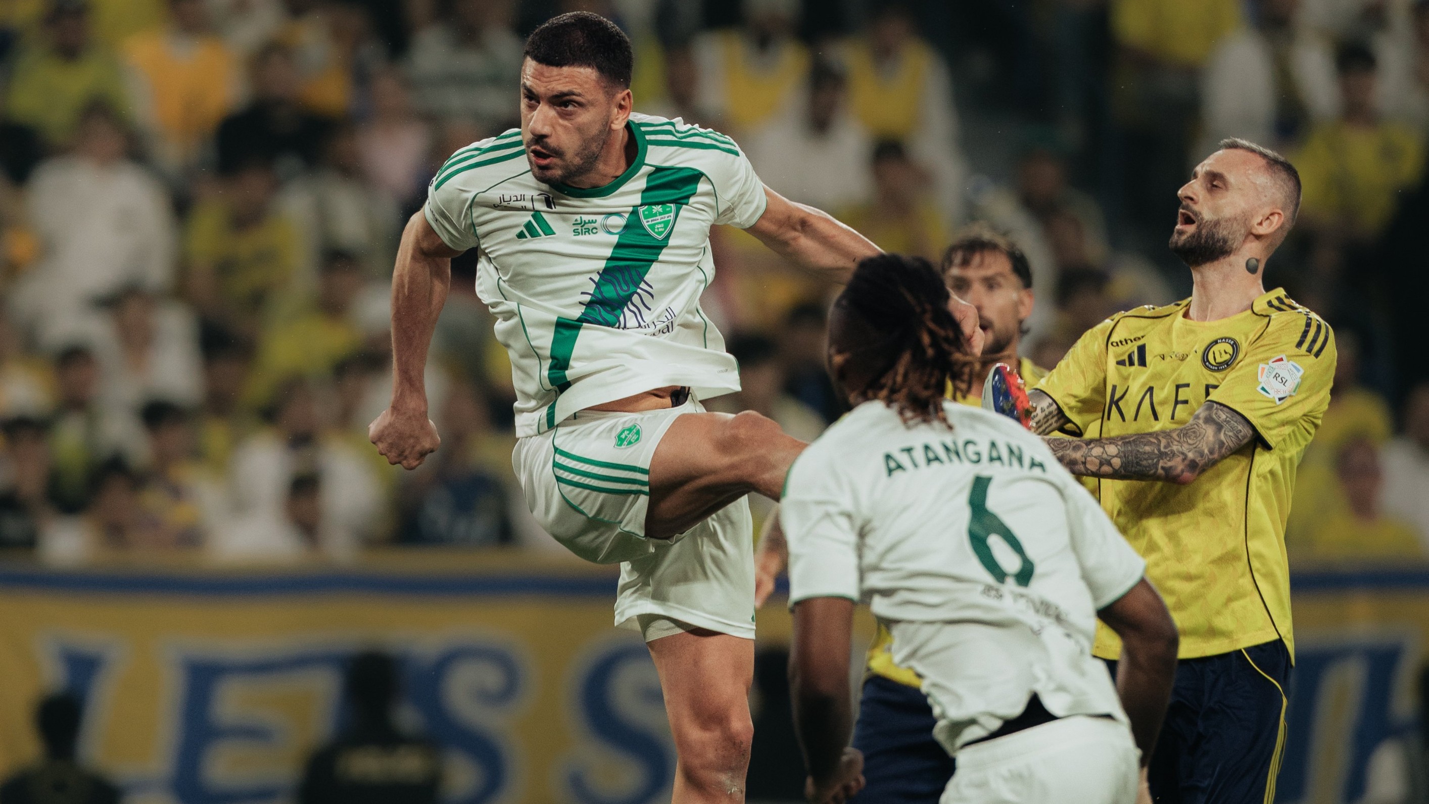 Al-Nassr and Al-Ahli footballers in action during Saudi Pro League Clash at Al-Awaal Park.  - ALAHLI_FCEN/X