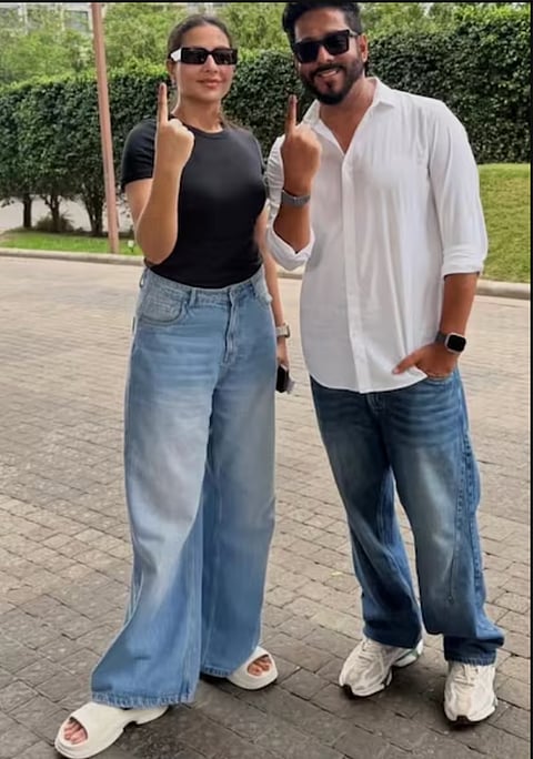 Director-politician Raj Chakarabarty with wife Subhashree Ganguly