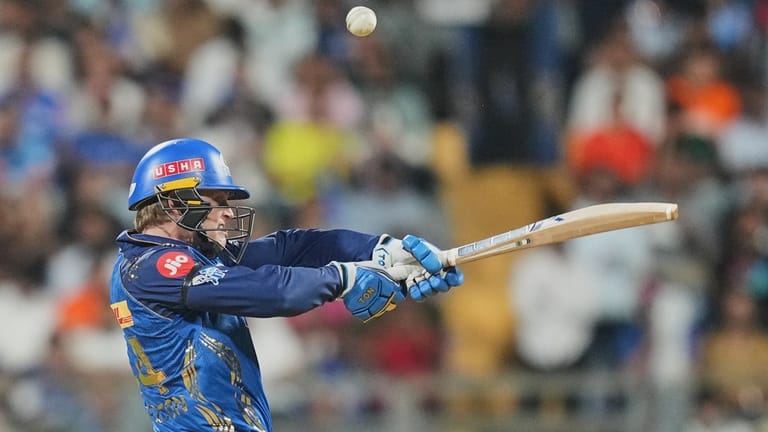 Ryan Rickelton plays a shot during the Indian Premier League cricket match between Mumbai Indians and Sunrisers Hyderabad in Mumbai. - AP