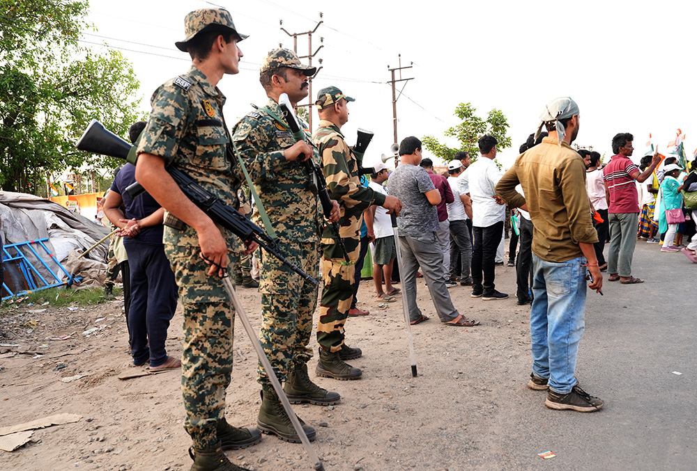 Armed security personnel keep vigil amid the West Bengal Assembly elections, in Kolkata.