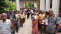 People wait in a queue to cast their votes during the second phase of the West Bengal Assembly elections, in Kolkata, Wednesday, April 29, 2026.  