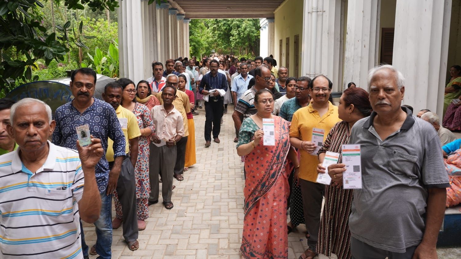 West Bengal Election 2026 Phase 2 Voting LIVE: 39.97% Per Cent Voter Turnout Recorded Till 11 AM Sandipan : People wait in a queue to cast their votes during the second phase of the West Bengal Assembly elections, in Kolkata, Wednesday, April 29, 2026.