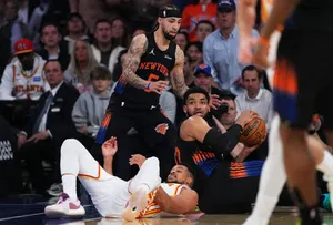| Photo: AP/Frank Franklin II : New York Knicks' Karl-Anthony Towns, right, and Jose Alvarado fights for control of the ball with Atlanta Hawks' CJ McCollumm below, during the first half in Game 5 of a first-round NBA playoffs basketball series, in New York.