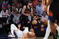 | Photo: AP/Frank Franklin II : New York Knicks' Karl-Anthony Towns, right, and Jose Alvarado fights for control of the ball with Atlanta Hawks' CJ McCollumm below, during the first half in Game 5 of a first-round NBA playoffs basketball series, in New York. 