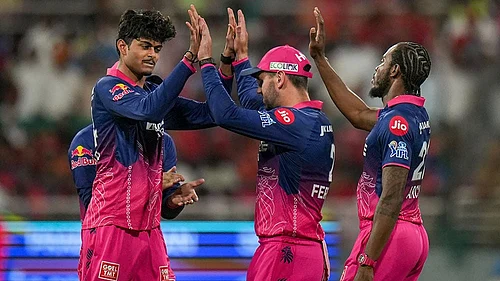 | Photo: PTI/Shiva Sharma : Rajasthan Royals' Yashraj Punja, left, celebrates with teammates after taking the wicket of Punjab Kings' Cooper Connolly during the Indian Premier League (IPL) 2026 T20 cricket match between Punjab Kings and Rajasthan Royals, in Mullanpur.