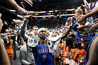 | Photo: AP/Ross D. Franklin : Oklahoma City Thunder guard Shai Gilgeous-Alexander celebrates with fans after Game 4 in a first-round NBA playoffs basketball series against the Phoenix Suns in Phoenix.